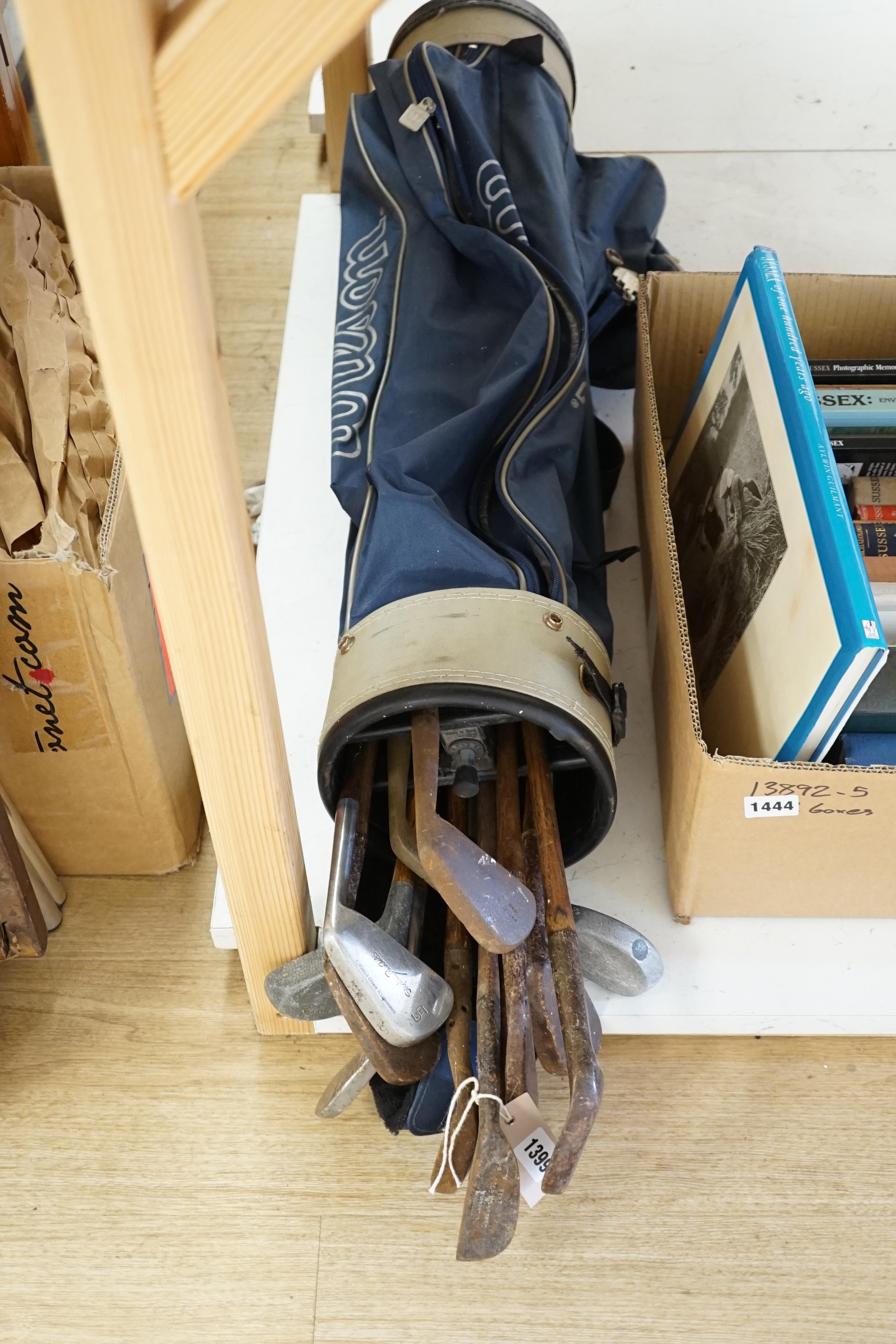 A collection of golf clubs, largely hickory shafted with two cases. Condition - varies